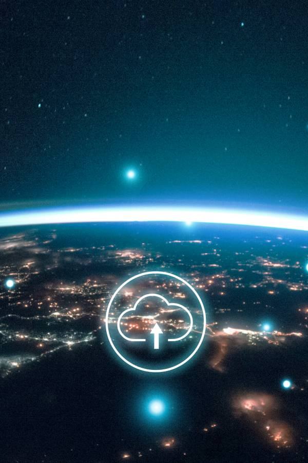 IT Projects 5 Cloud icon above a city skyline at night